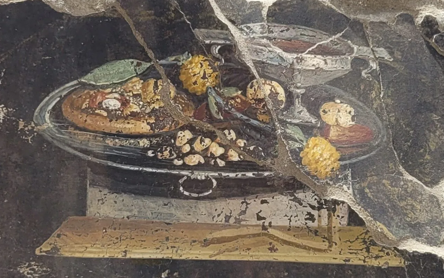 Lukisan pizza kuno di Pompeii.