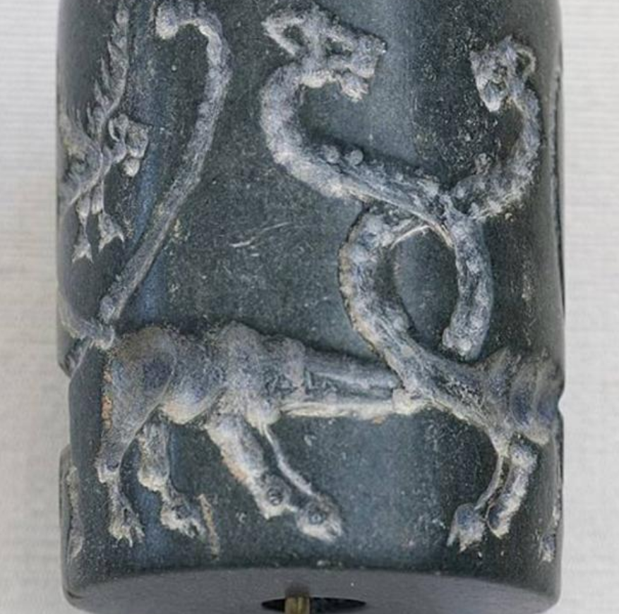Segel silinder Jasper: singa dan elang berkepala singa yang mengerikan, Mesopotamia, Periode Uruk (4100 SM-3000 SM). (Marie-Lan Nguyen / CC BY 3.0 )