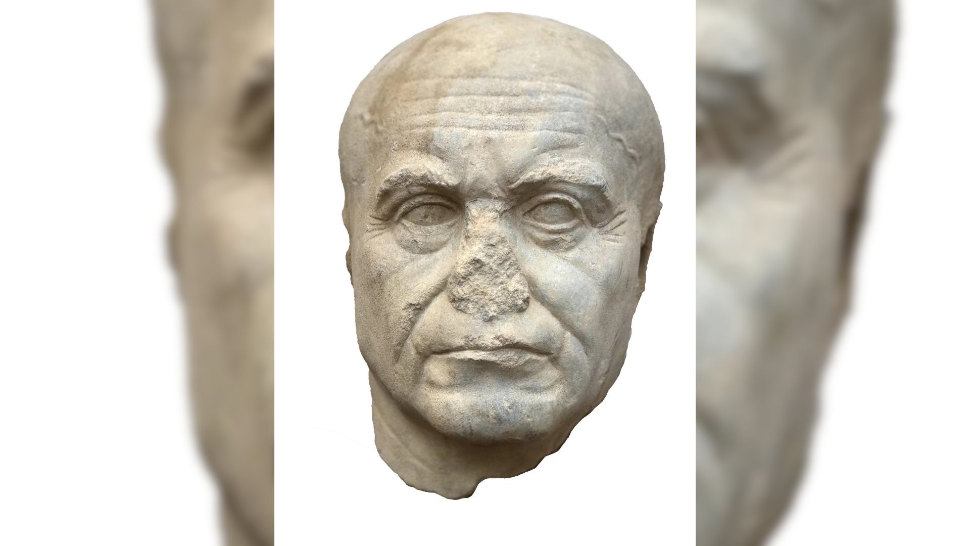 menemukan kepala patung marmer yang dibuat dengan indah yang menggambarkan seorang lelaki tua dari Periode Ptolemeus