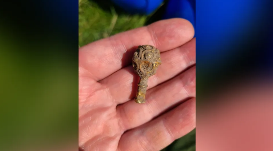 An archaeology student discovered the gold object on her first excavation. (Image credit: Portable Antiquities Scheme / Newcastle University)