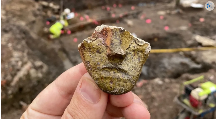 Sherd of a 13th-14th century jug with face.