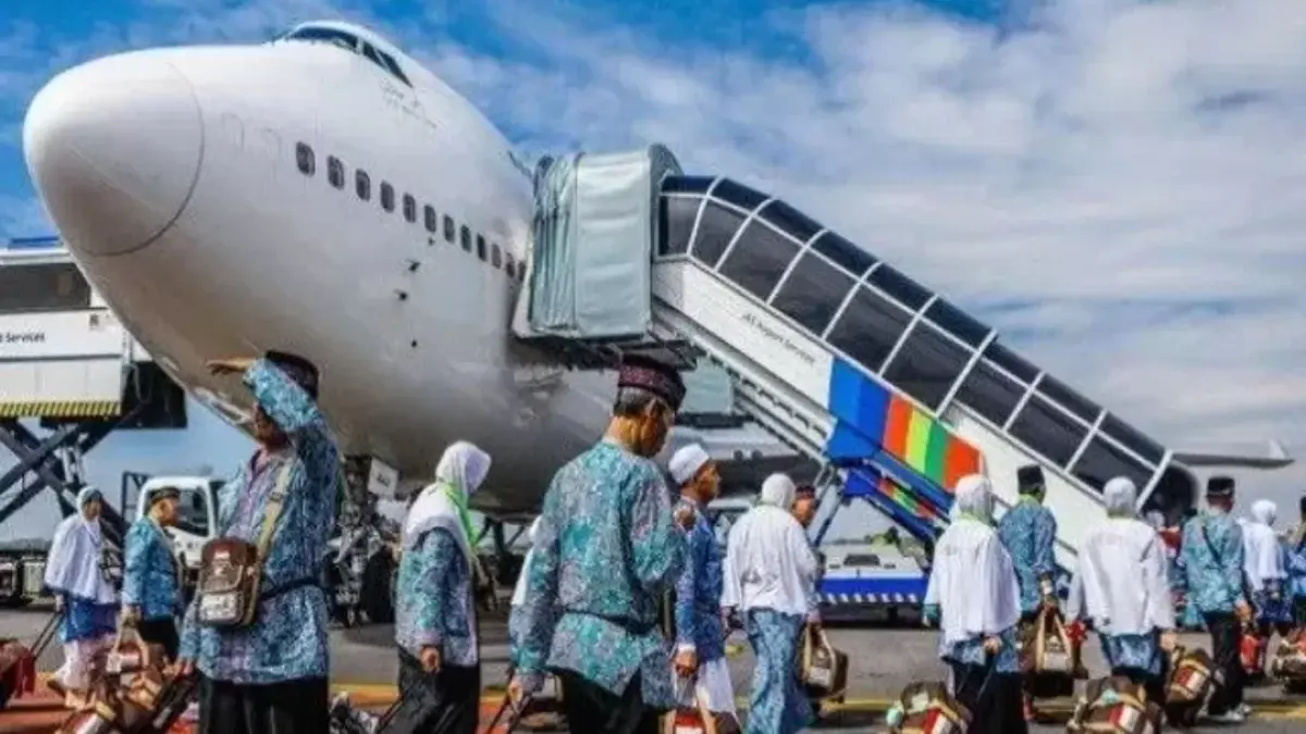 Ilustrasi jemaah haji menumpang pesawat Garuda Indonesia (Dok/JawaPos.com)