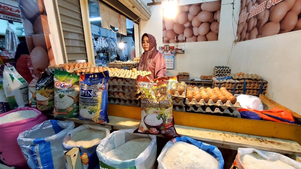 KP SUDAH TRADISI: Menjelang Ramadan, harga beberapa bahan pangan pokok di pasar tradisional seperti beras dan telur selalu mengalami kenaikan.