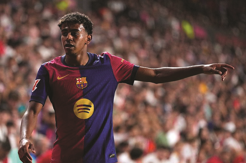 AP Photo/Manu Fernandez CEDERA HAMSTRING: Winger Barcelona Lamine Yamal berpotensi absen lama karena cedera hamstring.