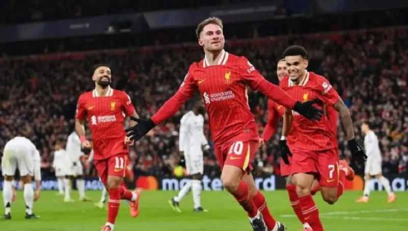 Liverpool RAIH KEMENANGAN: Selebrasi Alexis Mac Allister (tengah) setelah mencetak gol pembuka untuk Liverpool dalam pertandingan Liga Champions 2024/25 lawan Real Madrid di Stadion Anfield, Kamis (2