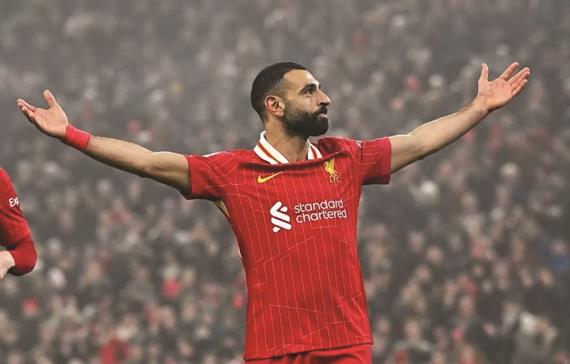 TAMPIL IMPRESIF: Selebrasi Mohamed Salah saat Liverpool berhasil menumbangkan Leicester (27/12) Desember lalu.