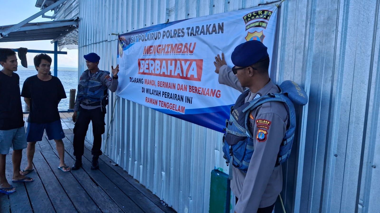 LARANGAN: Spanduk larangan berenang yang dipasang Satpolairud Polres Tarakan di wilayah pesisir. FOTO: SATPOLAIRUD POLRES TARAKAN