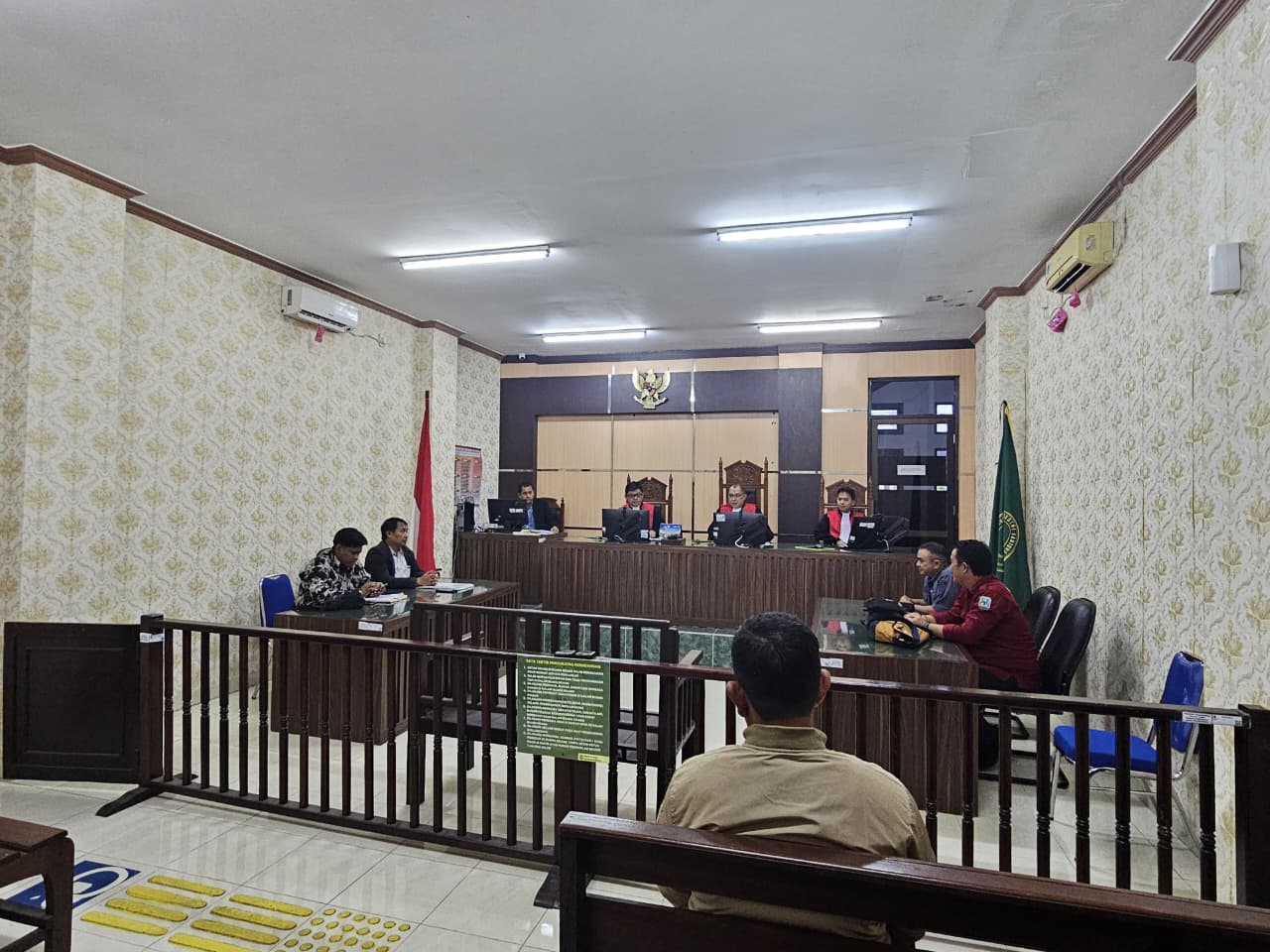 SIDANG PERDANA: Suasana sidang perdana di PN Tanjung Selor Kelas I-A gugatan warga terhadap KIHI Tanah Kuning-Mangkupadi.