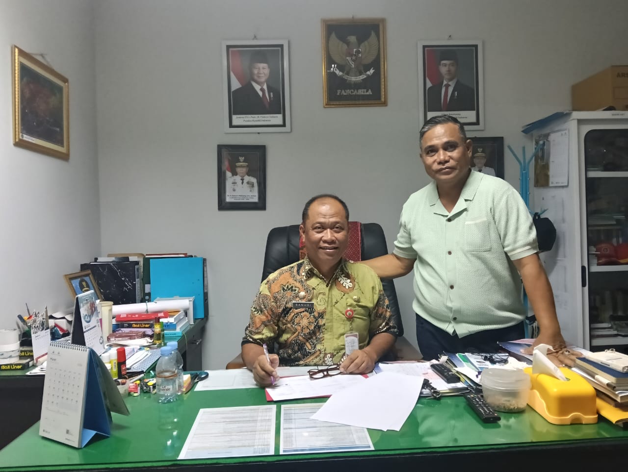 KOORDINASI : Kepala BPPD Kabupaten Nunukan, Robby Nahak Serang saat bertemu Dinas Kependudukan dan Pencatatan Sipil (Disdukcapil) Provinsi Kaltara, Sanusi belum lama ini.  