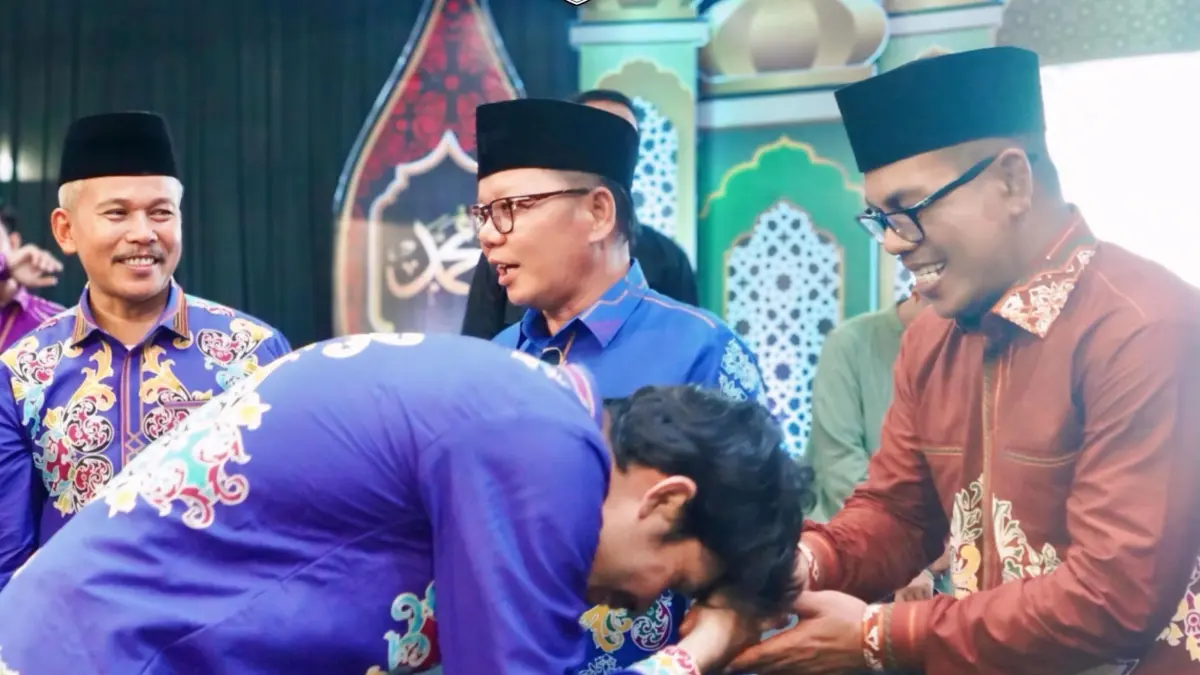 BERI DUKUNGAN: Wabup Sabri bersama Sekda H. Hersonsyah dan Kakan Kemenag Tana Tidung H. Hamzah menghadiri langsung pembukaan MTQ tingkat provinsi di Malinau, Senin (29/6) malam. (FOTO: DISKOMINFO)