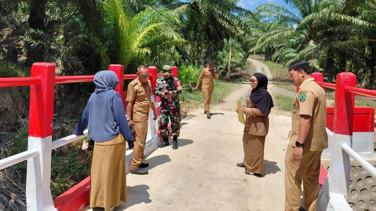 KONEKTIVITAS : Hadirnya jembatan garuda memudahan mobilitas dan mendukung aktivitas sehari-hari masyarakat Desa Tanjung Karang.