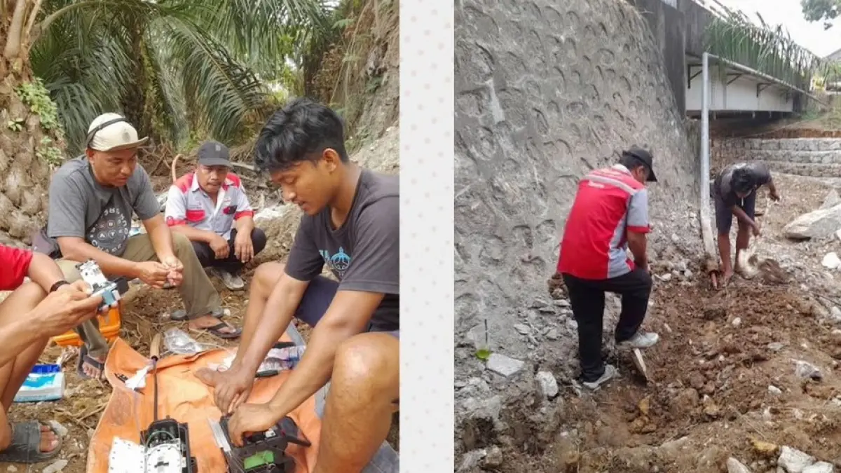 PEMULIHAN: Petugas Telkomsel melakukan kabel FO yang putus. (FOTO; IST)