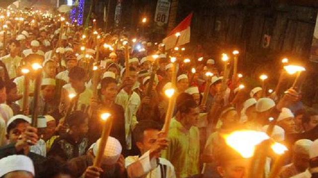 SEMPAT VAKUM: Tradisi pawai obor yang digelar di Tanjung Selor pada tahun 2019 silam. (IST)
