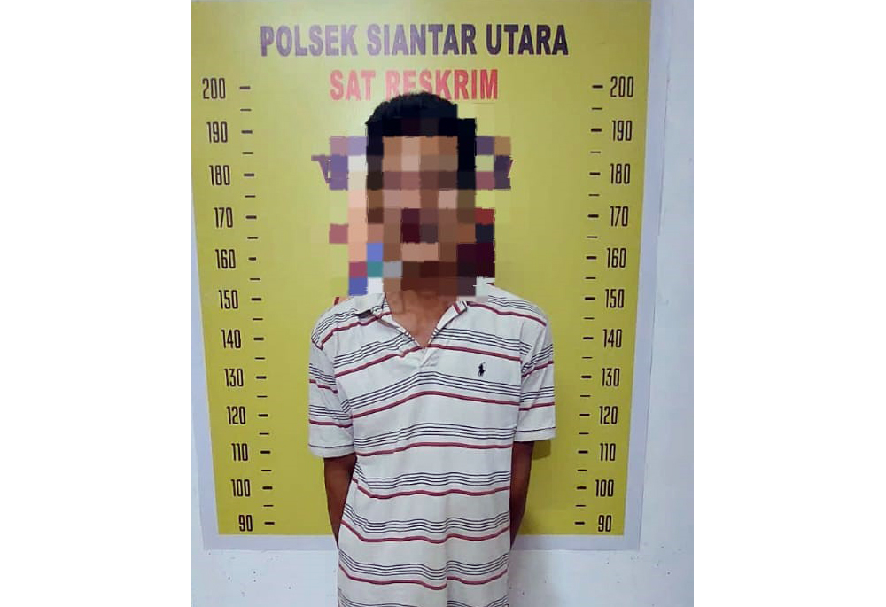 JS, tersangka pelaku penganiayaan tetangga.