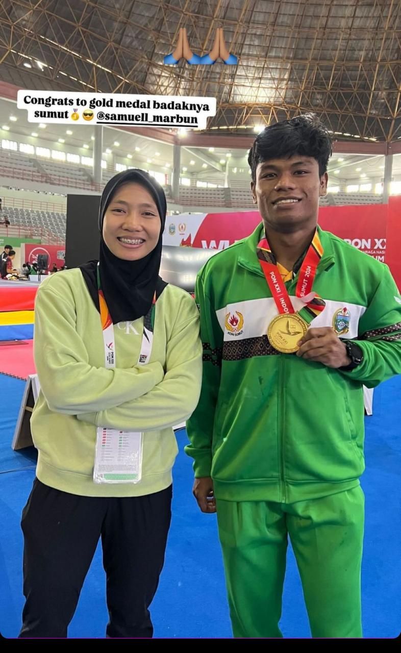 Samuel Marbun meraih medali emas PON XXI Aceh-Sumut.