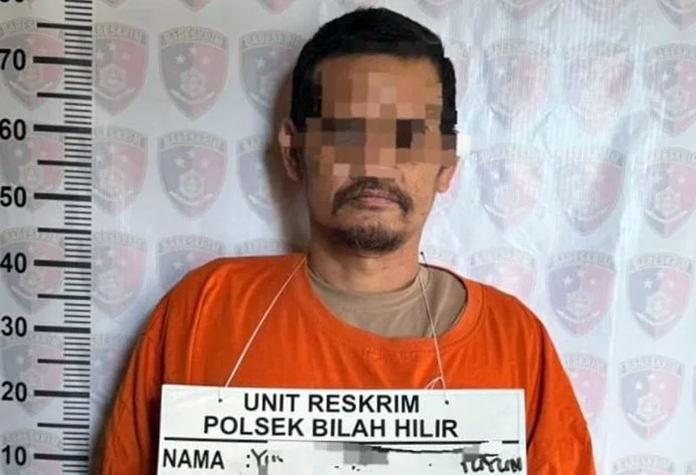 Pelaku perampokan, Yuyun diboyong ke Polsek Bilah Hilir usai ditangkap.