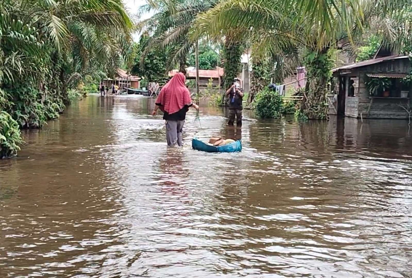 Banjir di Kota Tanjungbalai akibat intensitas hujan tinggi.