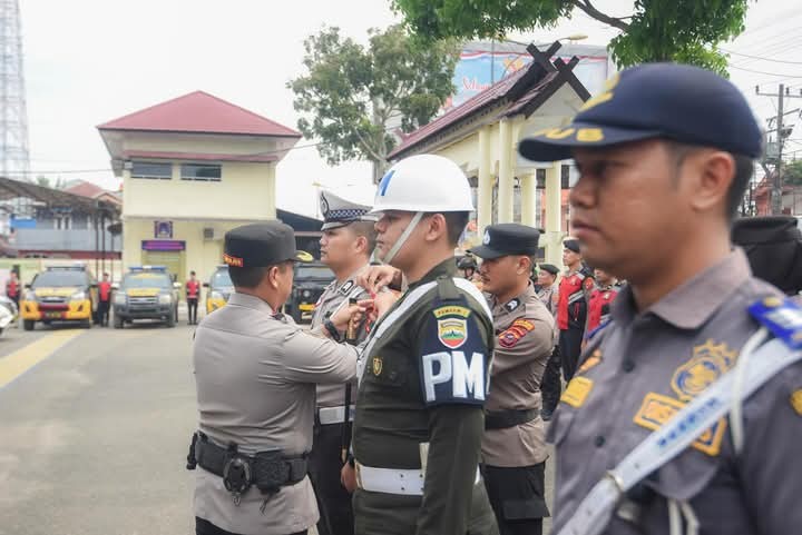 Apel Gelar Pasukan "Operasi Ketupat Toba 2025" dalam rangka pengamanan Hari Raya Idul Fitri 1446 H di lapangan Apel Mapolres Padangsidimpuan.