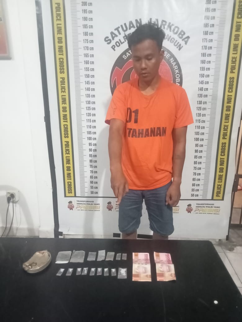 Imanuel Boby Cristian Sinuhaji (31), warga Nagori Tanjung Pasir ditangkap dalam penggerebekan pada Jumat (21/3).