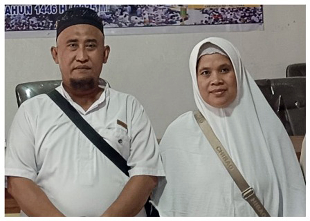Pasangan suami-istri Heriyanto dan Nurainun, yang bernagkat naik haji.