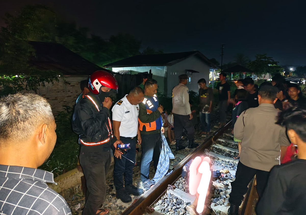 Lokasi penemuan jasad pria berinisial RG (43) di rel kereta api Kelurahan Lestari, Kisaran Timur. Korban diduga tertabrak kereta.
