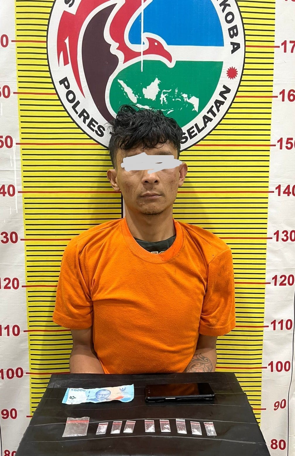 Tersangka ASP dan barang bukti.