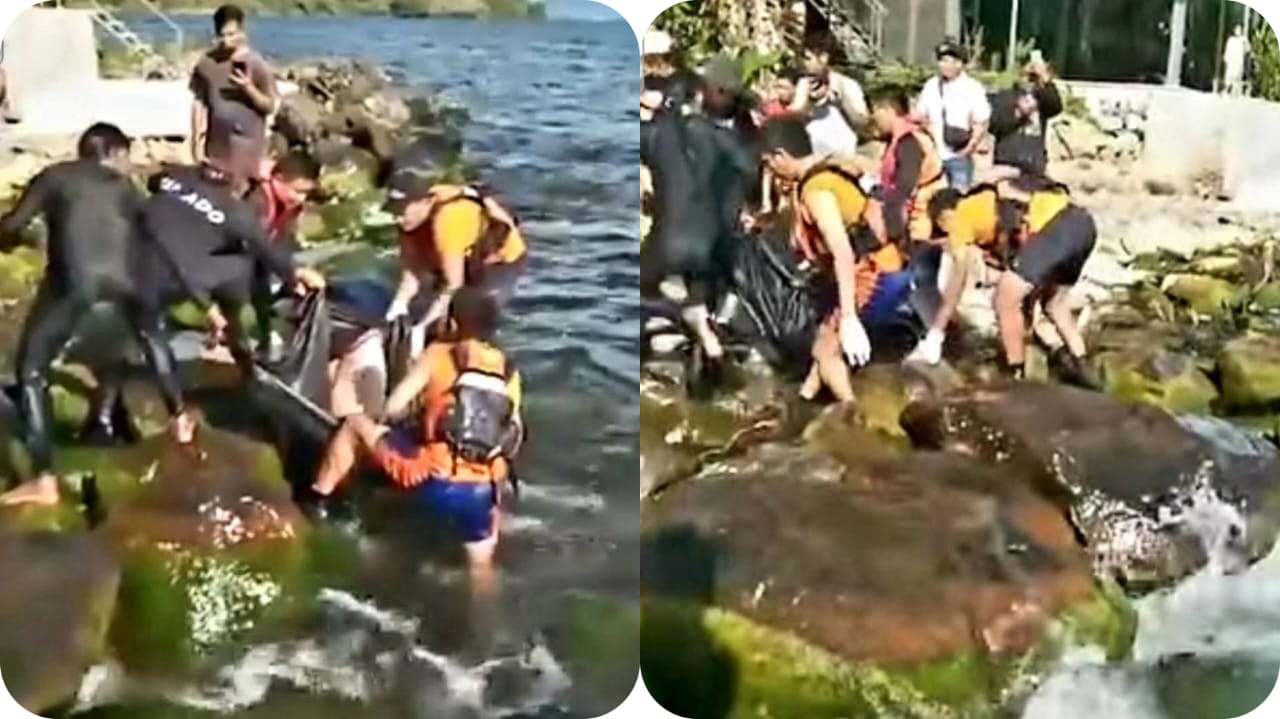 |jenazah Amran Malau saat dievakuasi, usai ditemukan mengapung di perairan Danau Toba.