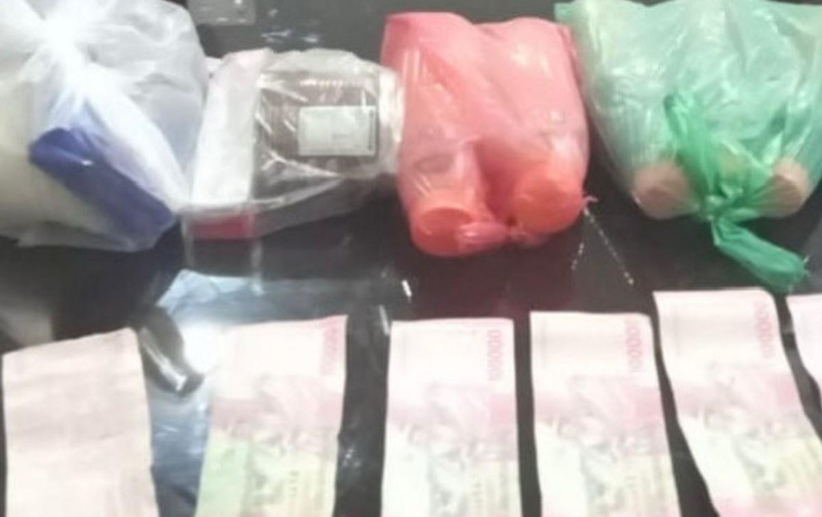 Barang bukti uang palsu.