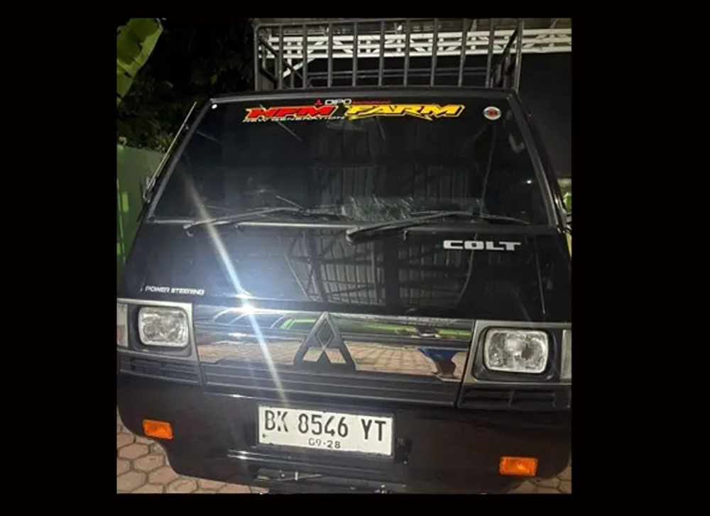Mobil Mitsubishi Colt warna hitam BK 8546 YT milik abang Ketua PAC PP Labura yang dilaporkan hilang di Simpang Panigoran.