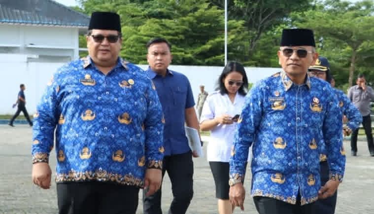 Bupati Simalungun Dr. H. Anton Achmad Saragih memimpin upacara Hari Kesadaran Nasional dan menekankan pelayanan Adminduk terbaik bagi masyarakat.