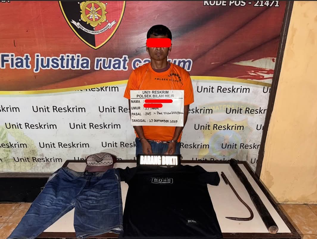 Tersangka HS saat diamankan polisi.