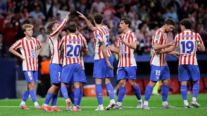 Para pemain Atletico Madrid merayakan kemenangan besar atas Eintracht Frankfurt di Liga Champions, usai pesta gol 5-1 di Wanda Metropolitano.