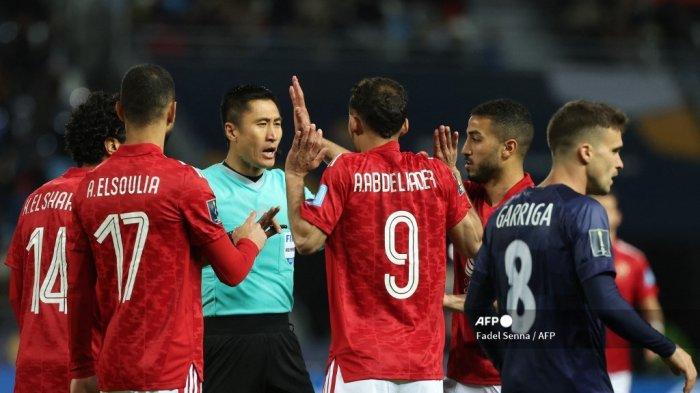 Wasit Ma Ning asal China.