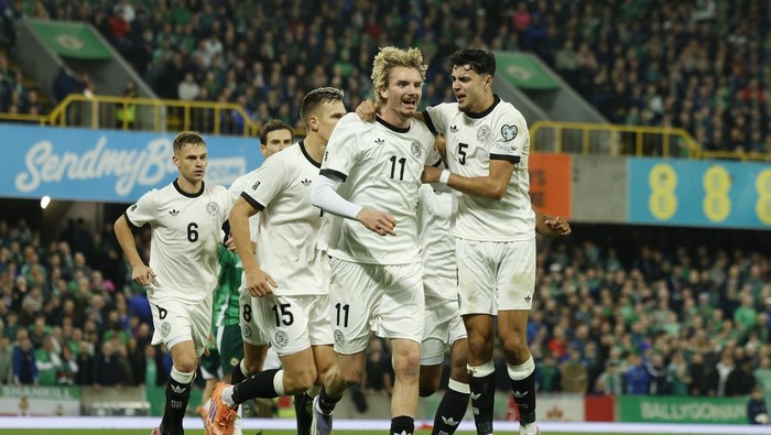 Nick Woltemade merayakan gol tunggal yang membawa Jerman menang 1-0 atas Irlandia Utara di Windsor Park, Selasa (14/10/2025) dini hari WIB.