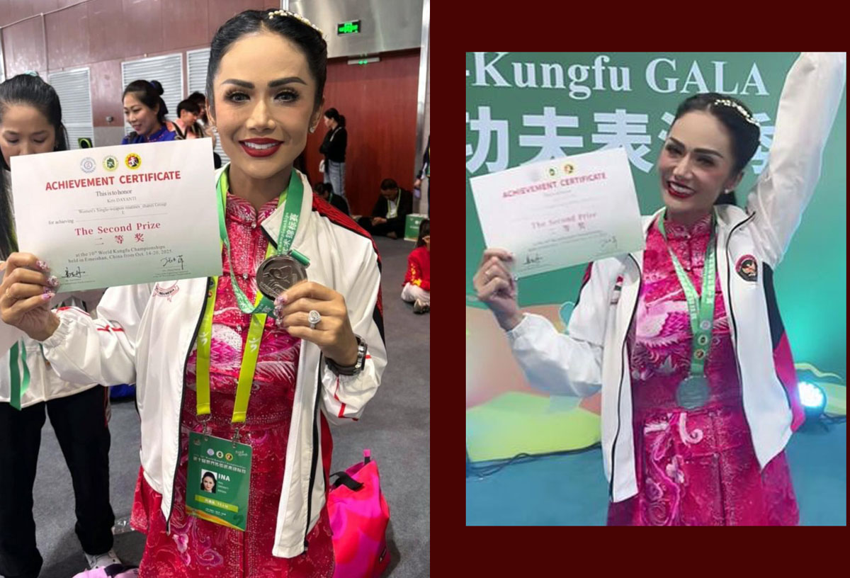 Kris Dayanti meraih medali perak pada kategori Women&rsquo;s Single-weapon routines &mdash; Shanzi Group E, Minggu (19/10).