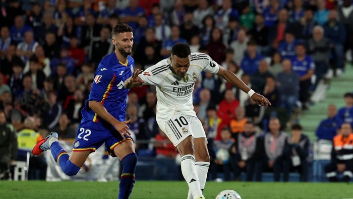 Kylian Mbappe mencetak gol kemenangan Real Madrid ke gawang Getafe di Estadio Coliseum.