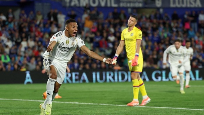 Kylian Mbappe merayakan gol ke gawang Getafe yang membuatnya menyamai rekor Cristiano Ronaldo di LaLiga.