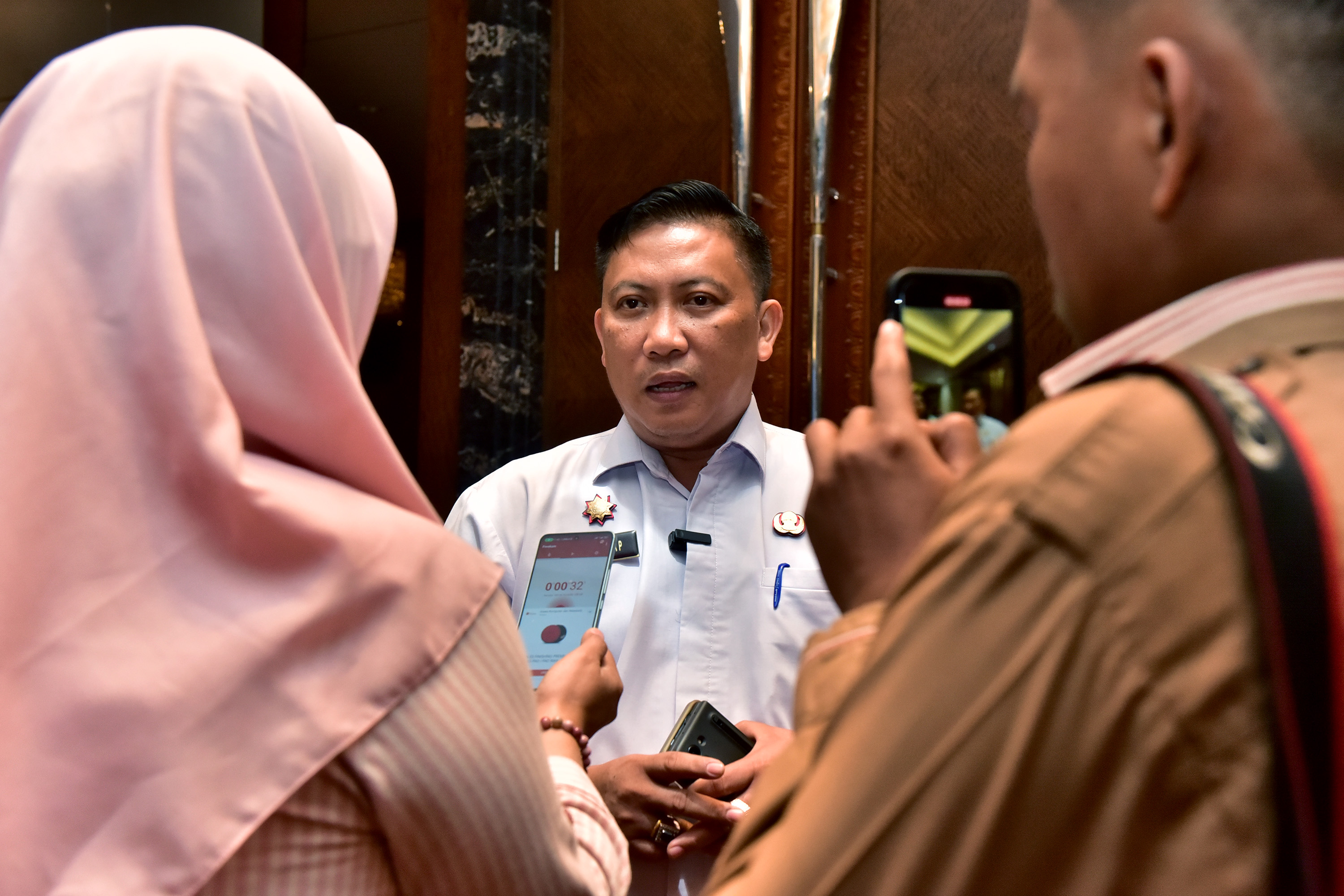 Kepala Dinas Komunikasi dan Informatika (Kominfo) Sumut Erwin Hotmansah Harahap memaparkan progres pembangunan platform layanan publik terpadu.