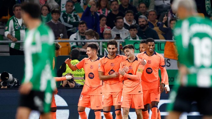 Ferran Torres merayakan hat-trick saat Barcelona membantai Real Betis 5-3 di Estadio La Cartuja de Sevilla.