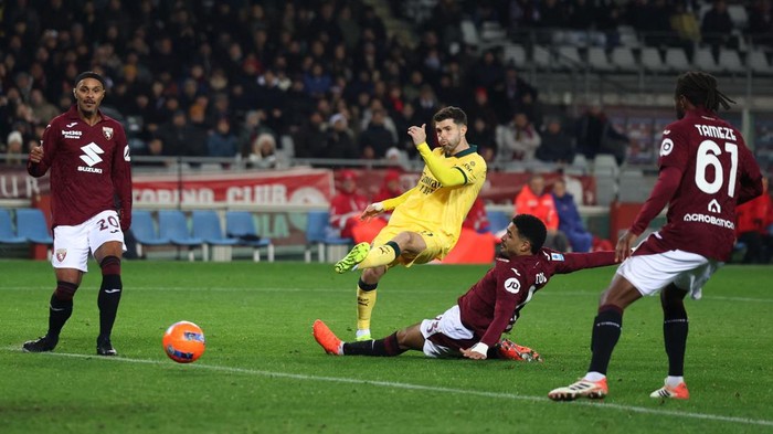 Christian Pulisic merayakan gol keduanya yang memastikan kemenangan comeback AC Milan atas Torino.