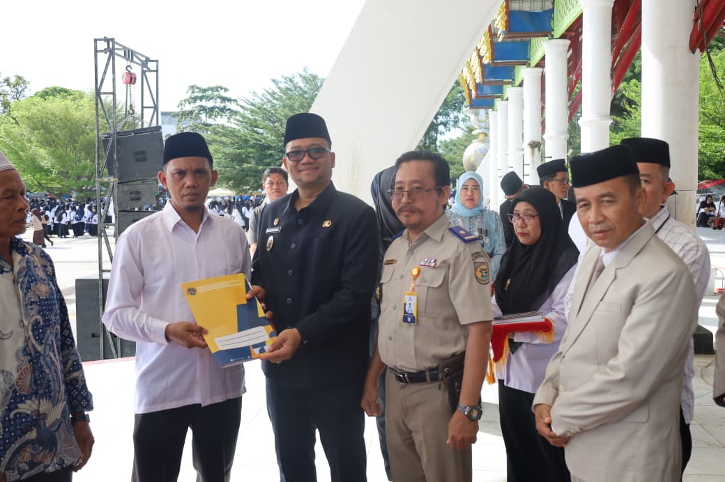 Upacara Hari Amal Bakti Kementerian Agama ke-80 Tingkat Kota Tanjungbalai di Lapangan Sultan Abdul Jalil Rahmadsyah, Sabtu (3/1/2026).