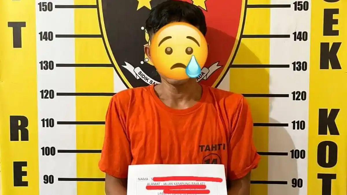 Tersangka SPN alias Putra diamankan di Polsek Kota Pinang bersama barang bukti dua unit handphone iPhone milik korban.