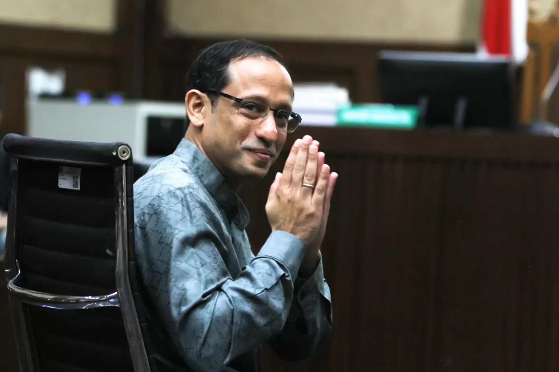 Mantan Mendikbudristek Nadiem Anwar Makarim saat mengikuti sidang pembacaan putusan sela di Pengadilan Tipikor Jakarta.