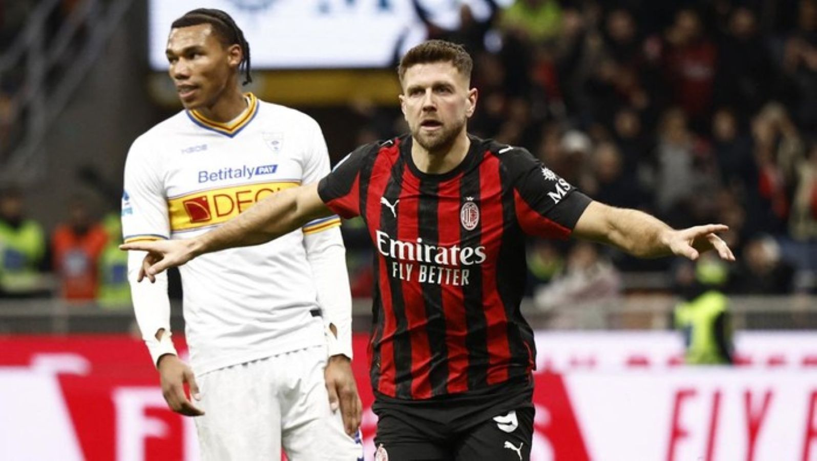 Niclas F&uuml;llkrug merayakan gol kemenangan AC Milan ke gawang Lecce pada lanjutan Serie A 2025/2026 di San Siro.