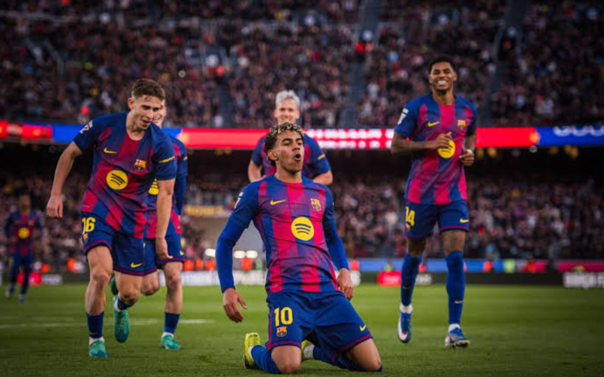 Lamine Yamal merayakan gol keduanya ke gawang Real Mallorca pada laga lanjutan Liga Spanyol di Spotify Camp Nou.