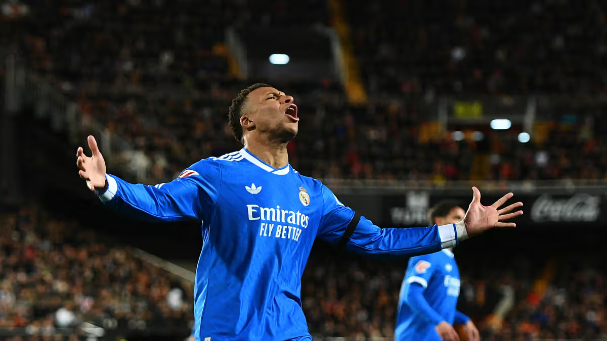 Kylian Mbappe merayakan golnya saat Real Madrid mengalahkan Valencia 2-0 pada laga Liga Spanyol di Stadion Mestalla, Senin (9/2/2026) dini hari WIB.