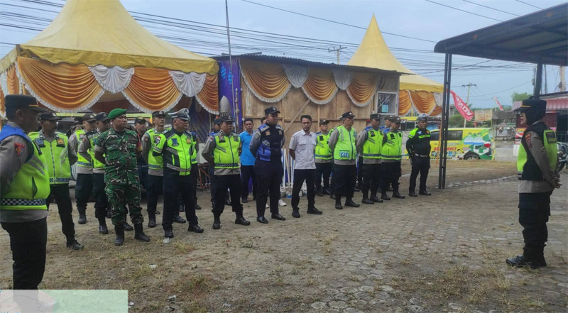 Kapolsek Na IX-X AKP Yustina saat pimpin apel di Pos Pelayanan 3 Kampung Pajak.