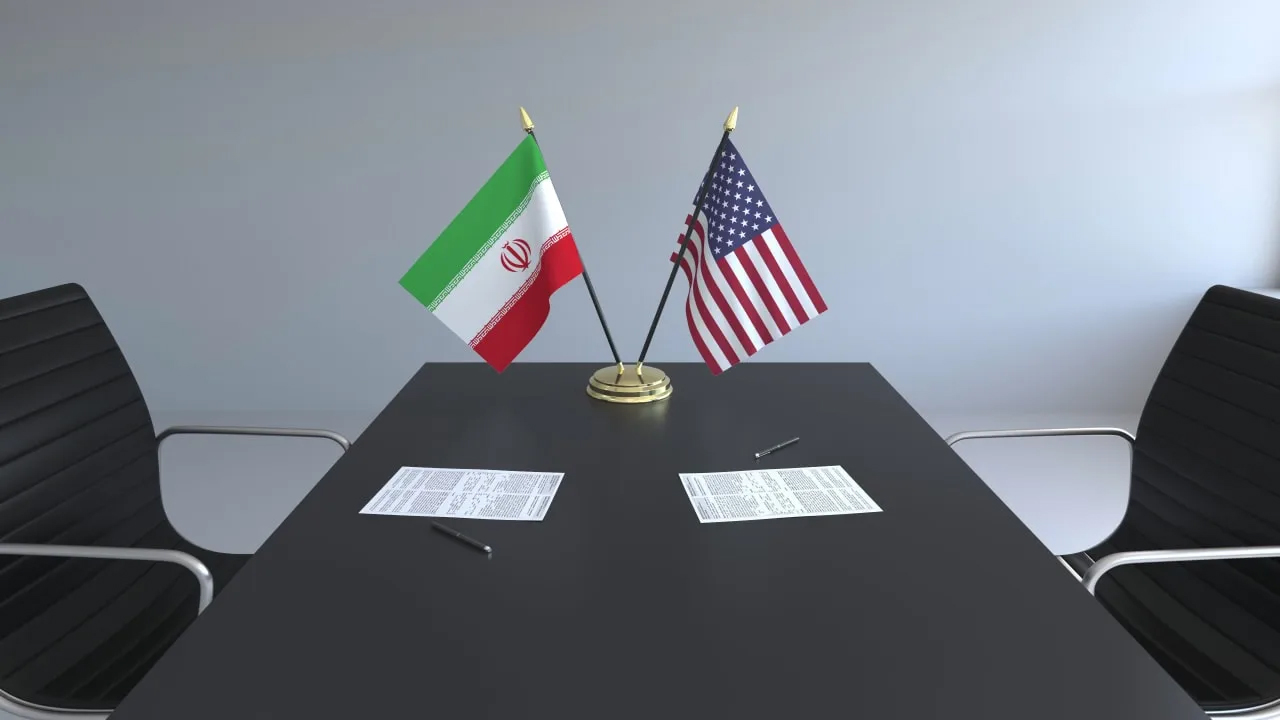 Ilustrasi negosiasi antara Amerika Serikat dan Iran di tengah ketegangan geopolitik serta peluang kesepakatan yang masih belum pasti.