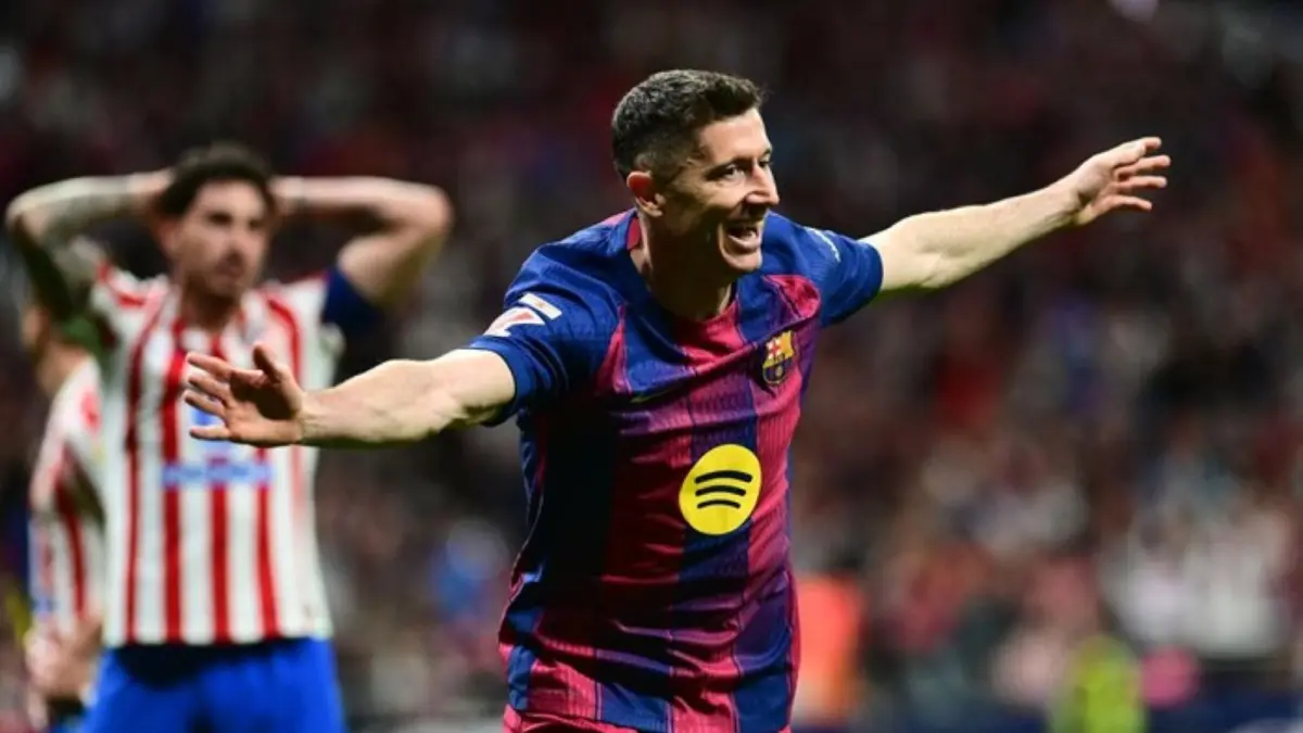 Robert Lewandowski mencetak gol kemenangan Barcelona ke gawang Atletico Madrid pada menit akhir laga La Liga di Wanda Metropolitano.