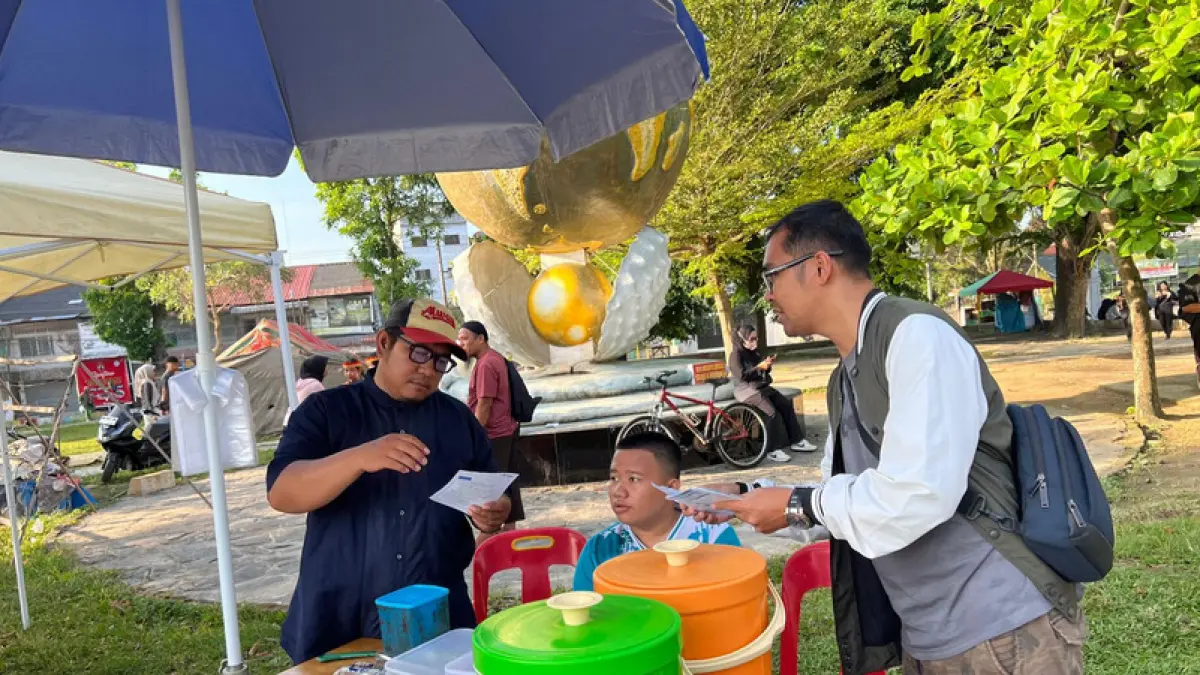 Sosialisasi dan edukasi BPJS Ketenagakerjaan pada kegiatan Car Free Day di Kota Tanjungbalai.